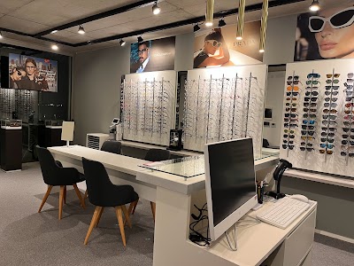 OPTICAS LAGUNA Puertos del Lago Escobar