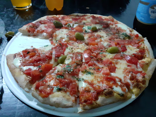 Pizzería "De lo Nuestro lo Mejor"