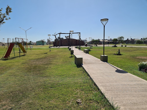 Monumento al Guinche y mural de los inmigrantes